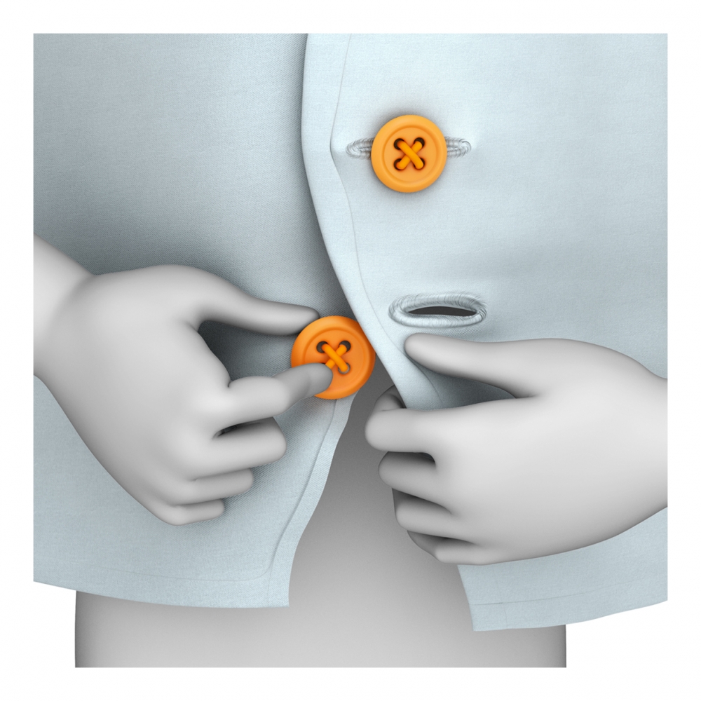 Imagen en la que se ven unas manos abrochando un botón