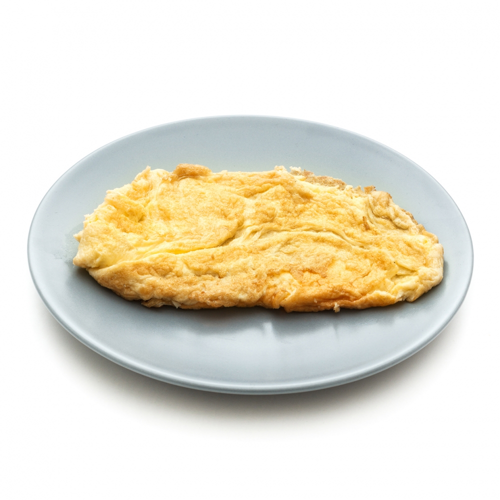 Imagen en el que se ve una tortilla francesa sobre un plato