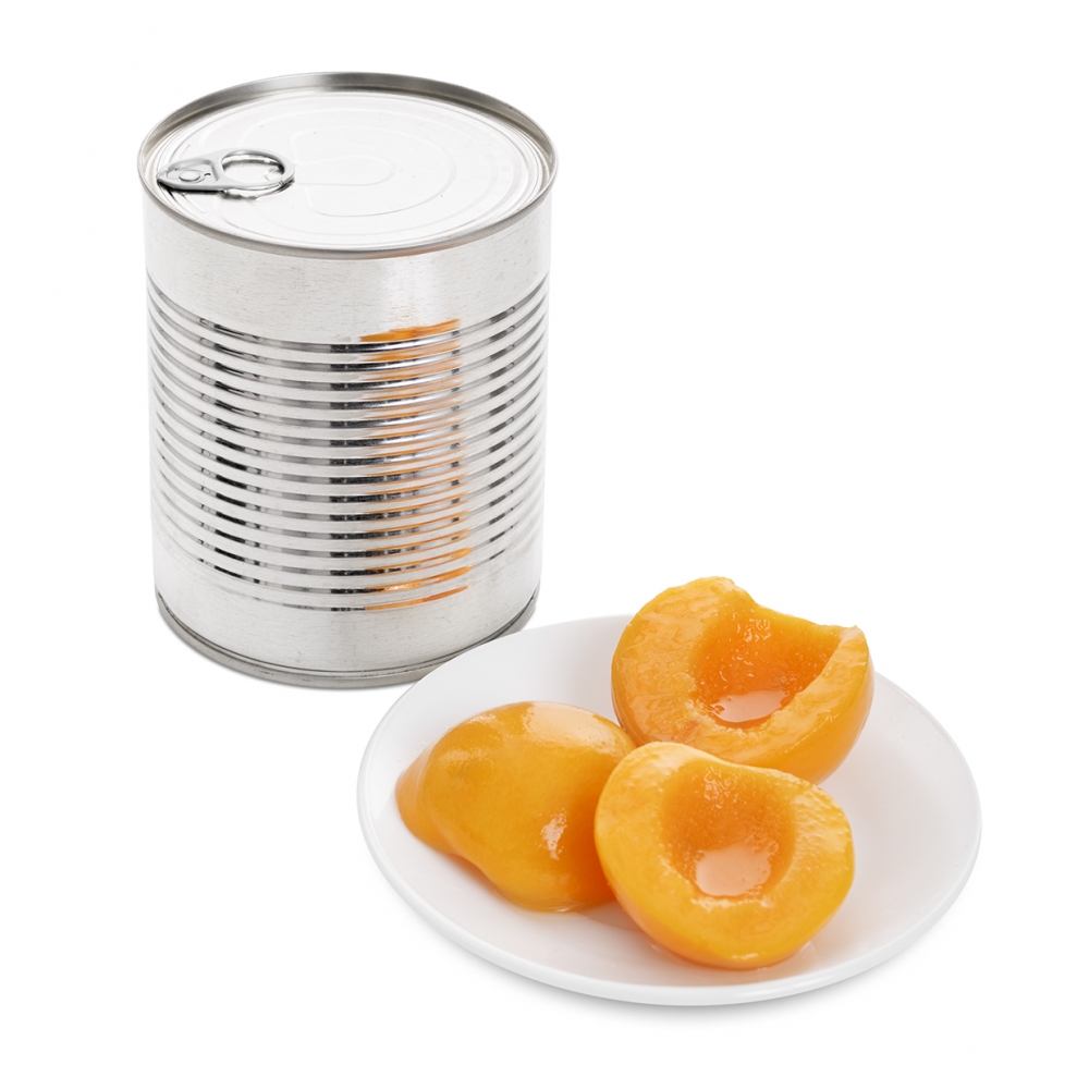 Imagen en la que se ve un bote de melocotón en almíbar