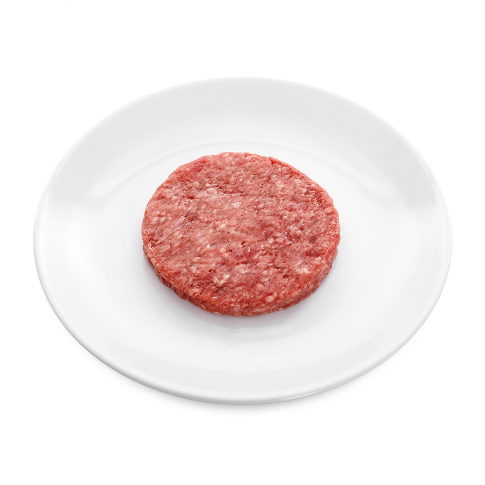 Imagen en la que se ve una hamburguesa sin cocinar