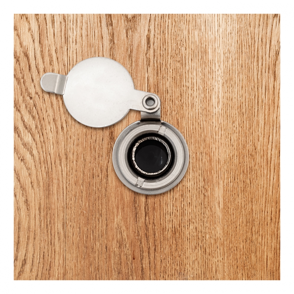 Imagen en la que se ve la mirilla de una puerta