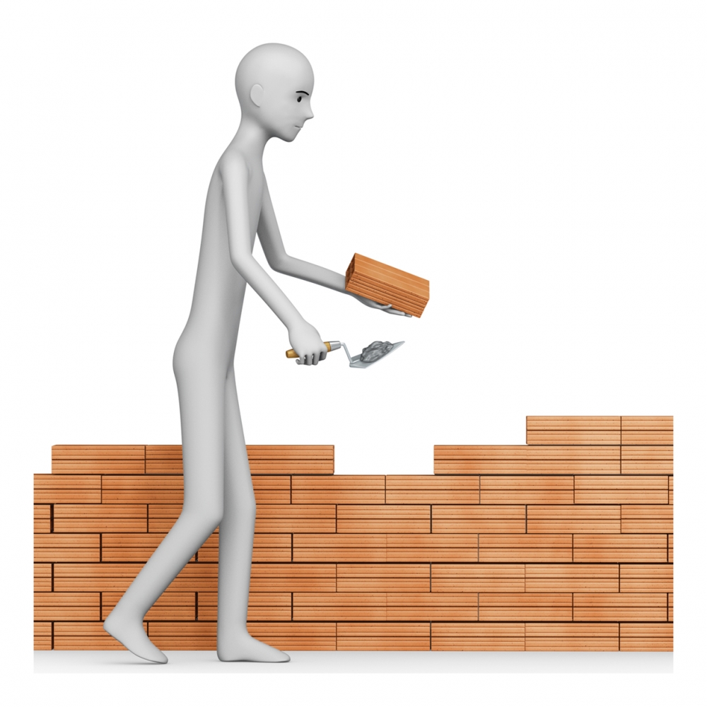 Imagen en la que aparece una persona construyendo una pared