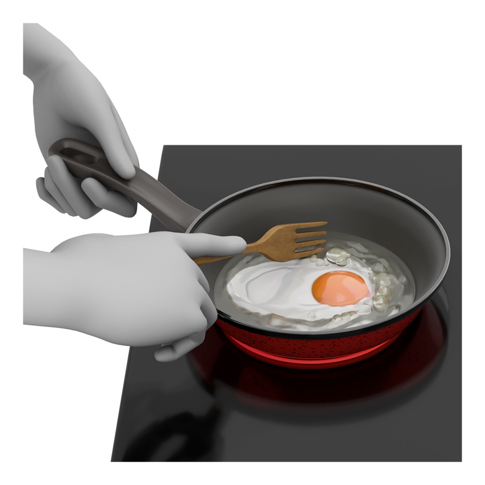 Imagen en la que se ve una mano friendo un huevo