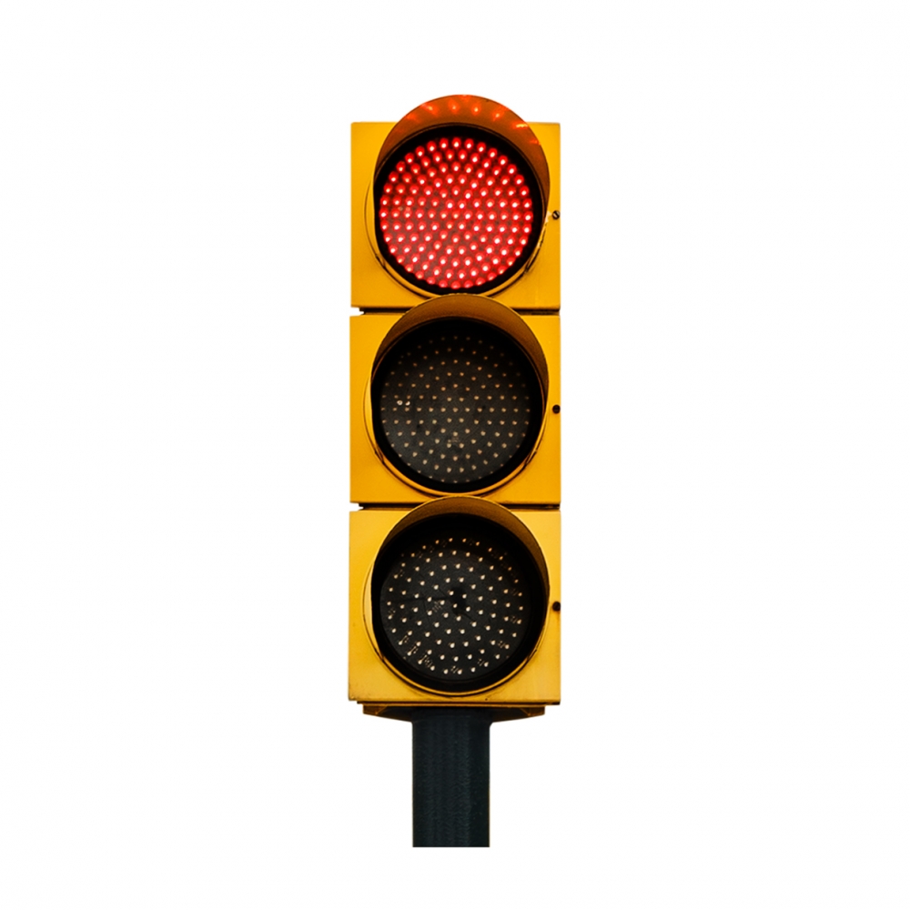 Imagen en la que se ve un semáforo con la luz roja iluminada