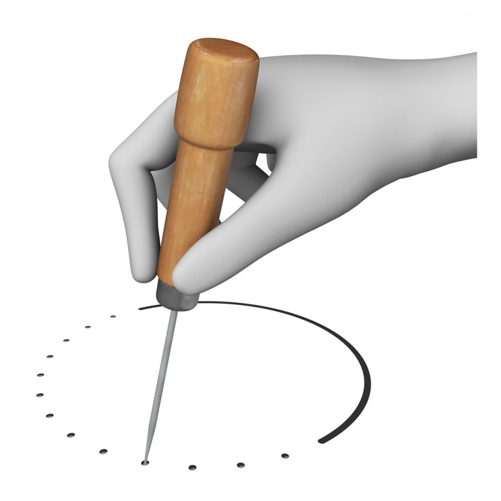 Imagen en la que una mano está picando una superficie con un punzón