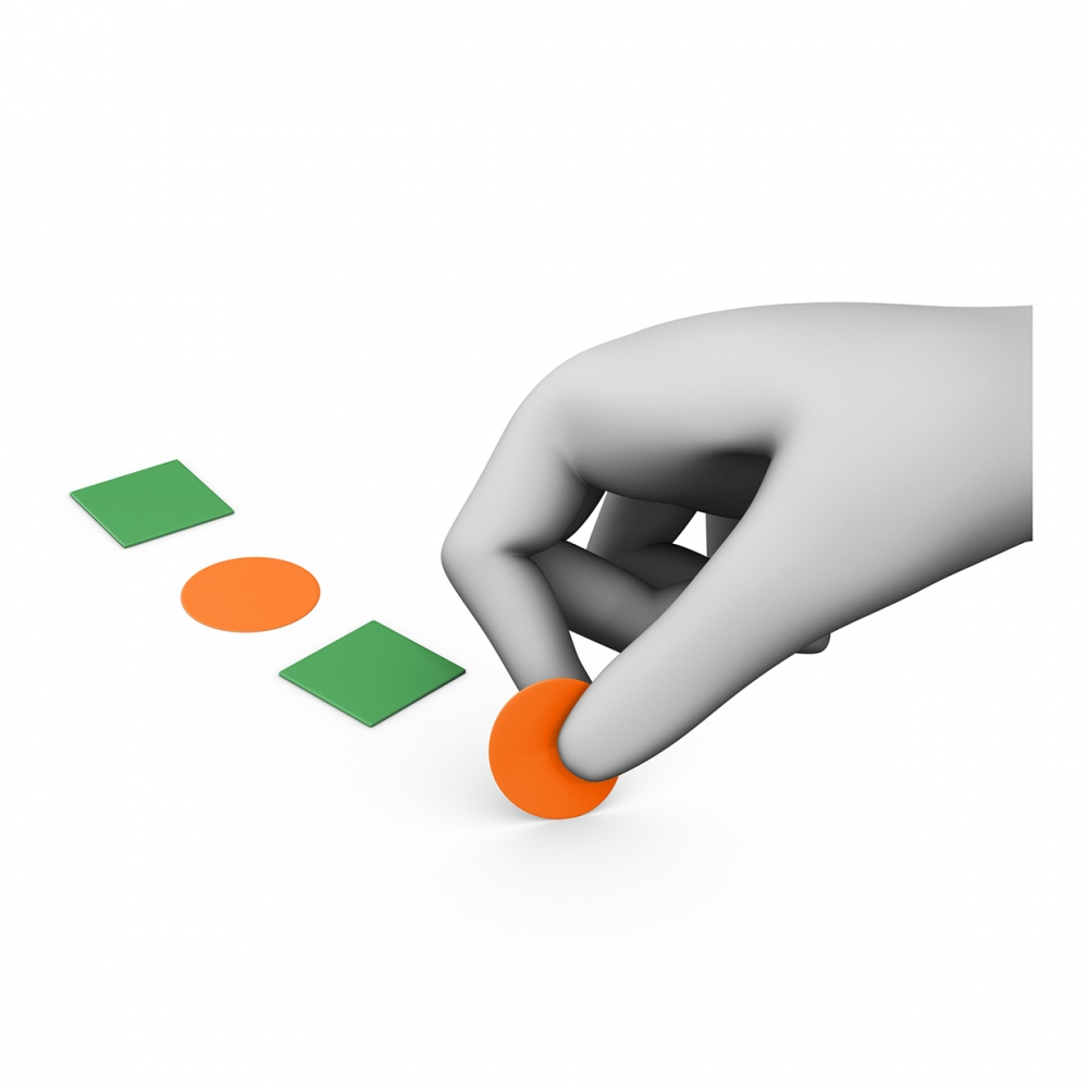 Imagen en la que se ve una mano poniendo gomets