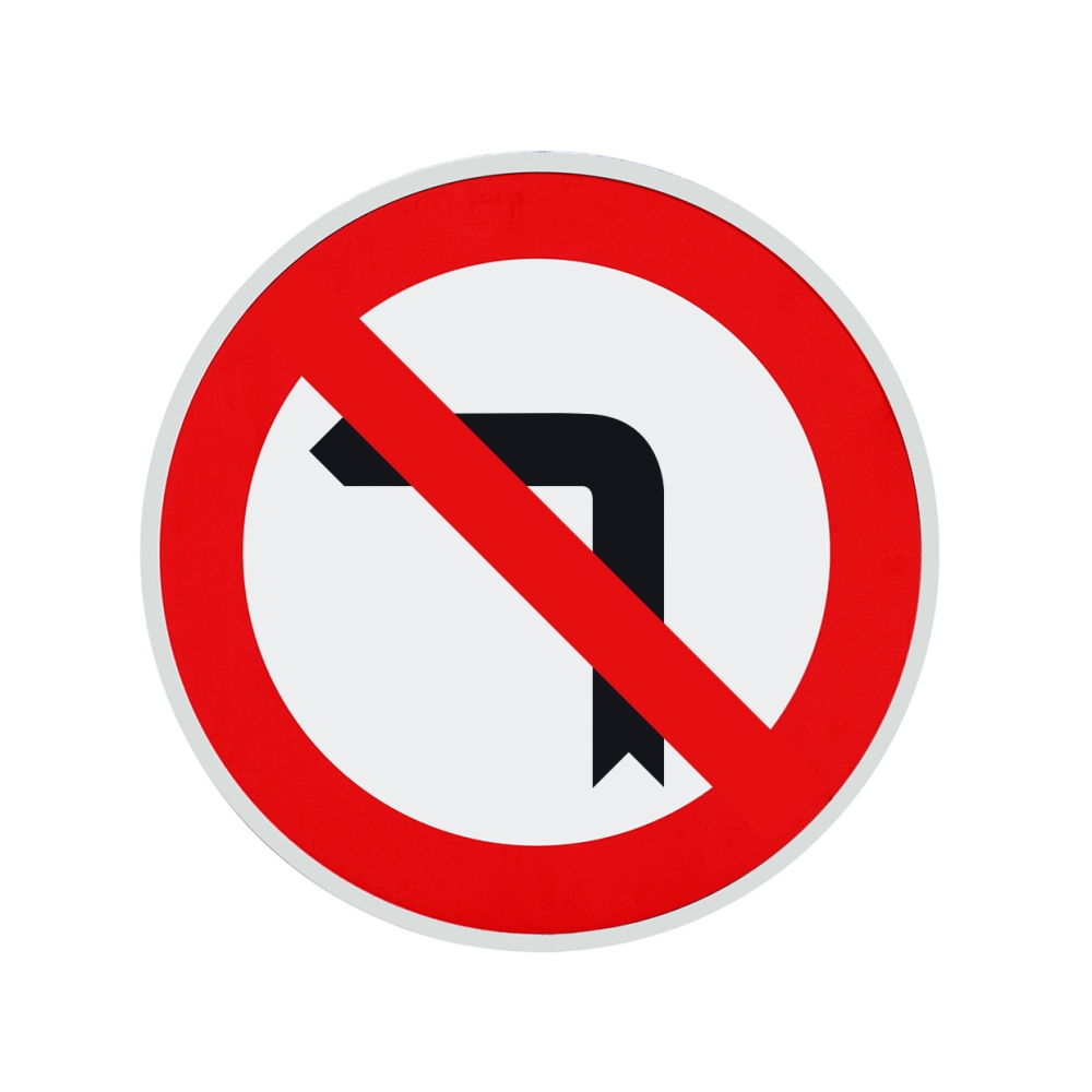 Imagen en la que se ve una señal de prohibido girar a la izquierda