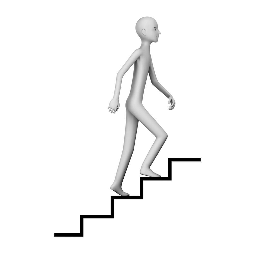 Imagen en la que aparece una persona subiendo las escaleras