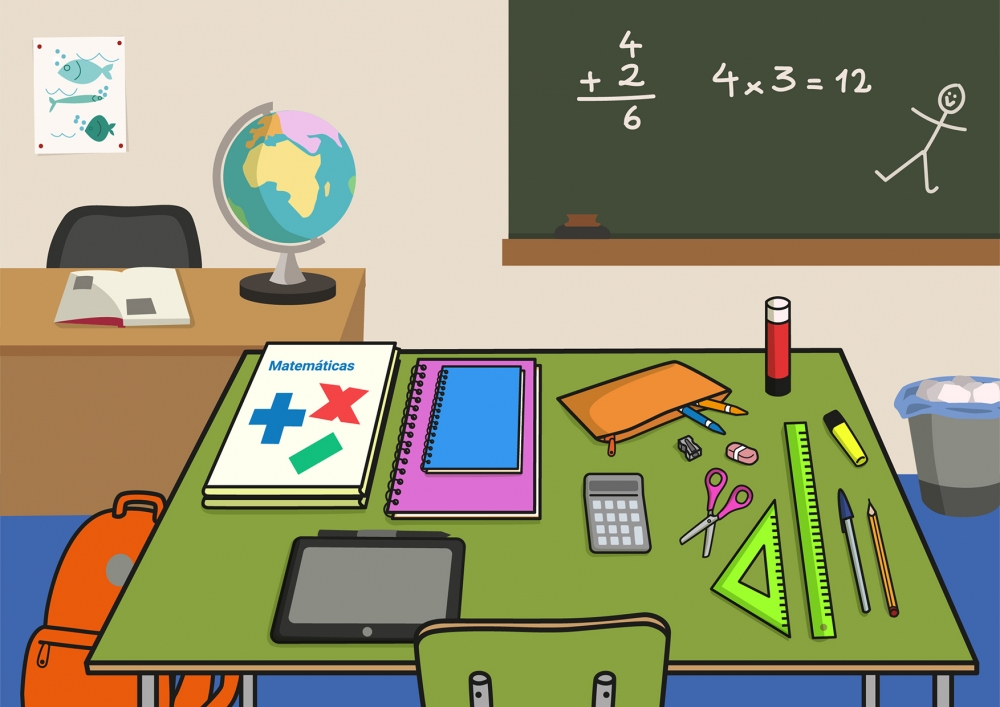 Escena en la que se ve una mesa de colegio con material escolar