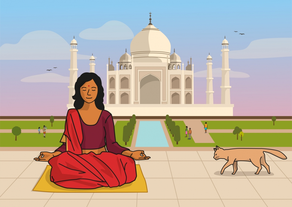Una chica hace yoga frente al Taj Mahal en India