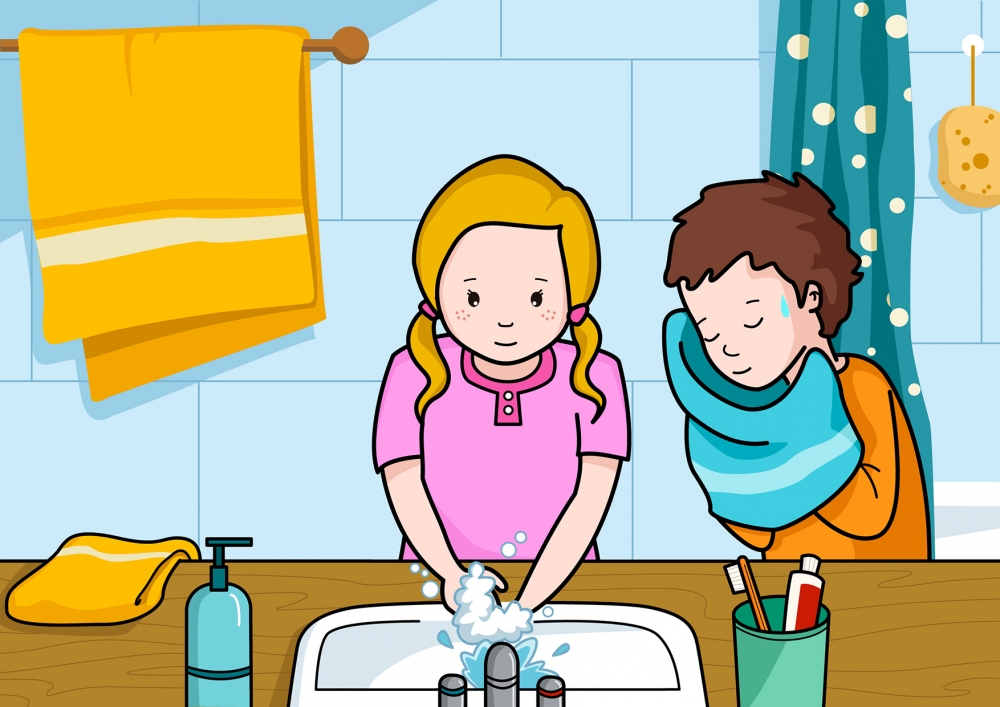 La niña se lava las manos y el niño se seca la cara