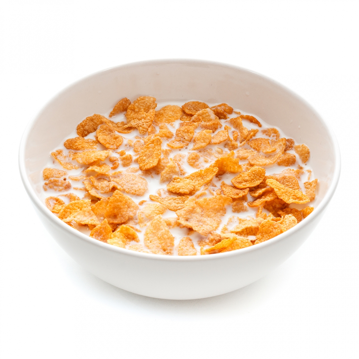 Imagen en la que se ve un bol lleno de cereales con leche