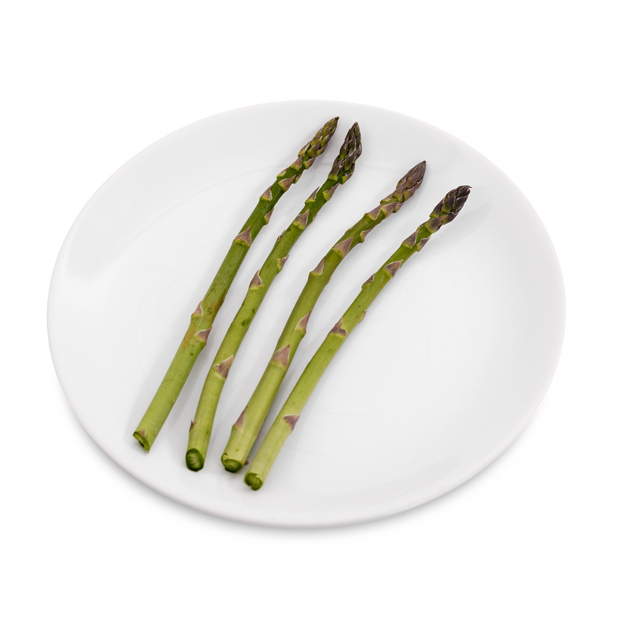 Imagen en la que se ven unos espárragos verdes