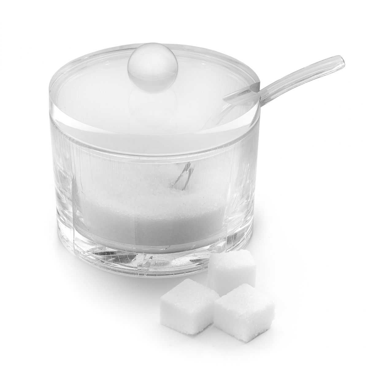 Imagen en la que se ve un azucarero con cucharilla