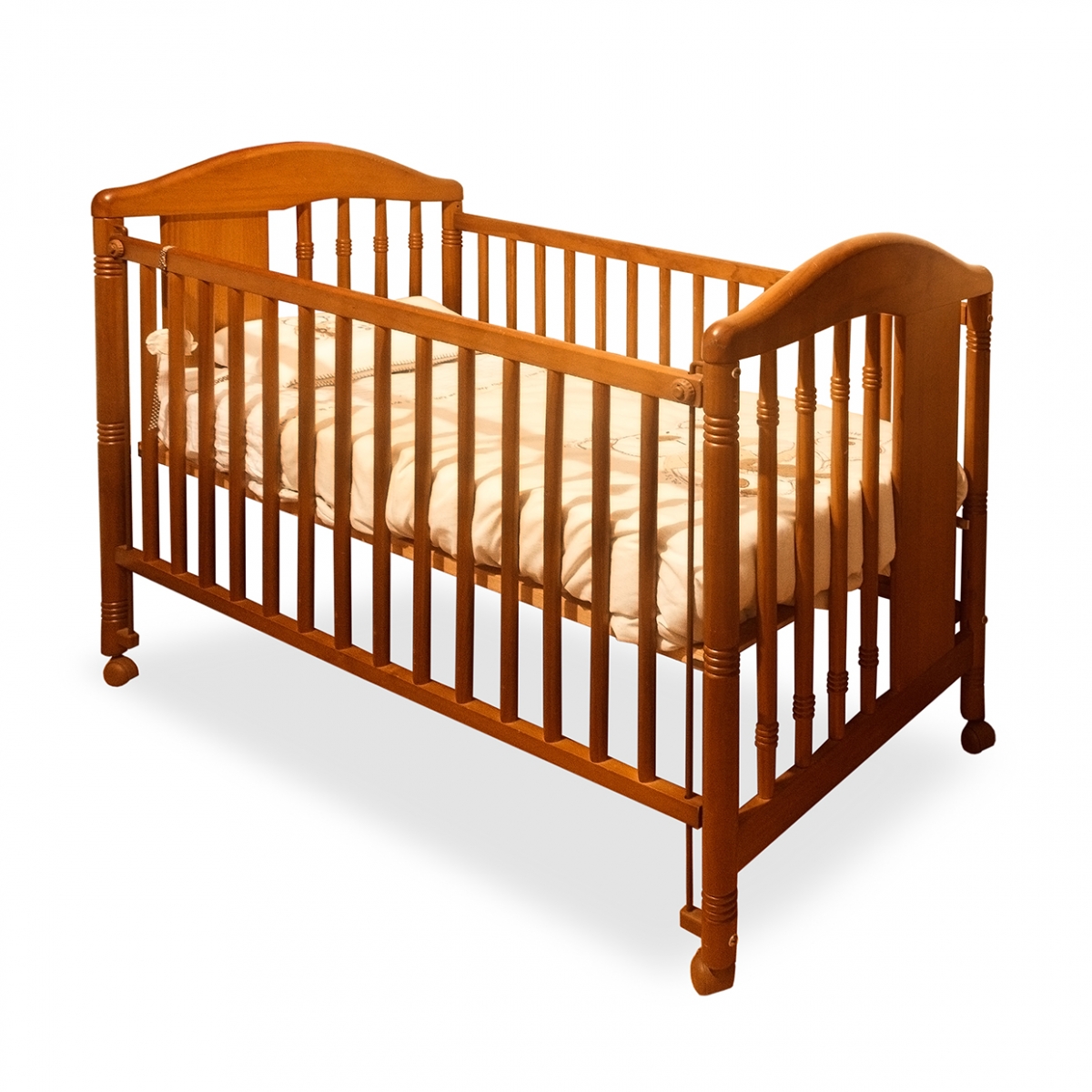 Imagen en la que se ve una cuna de madera