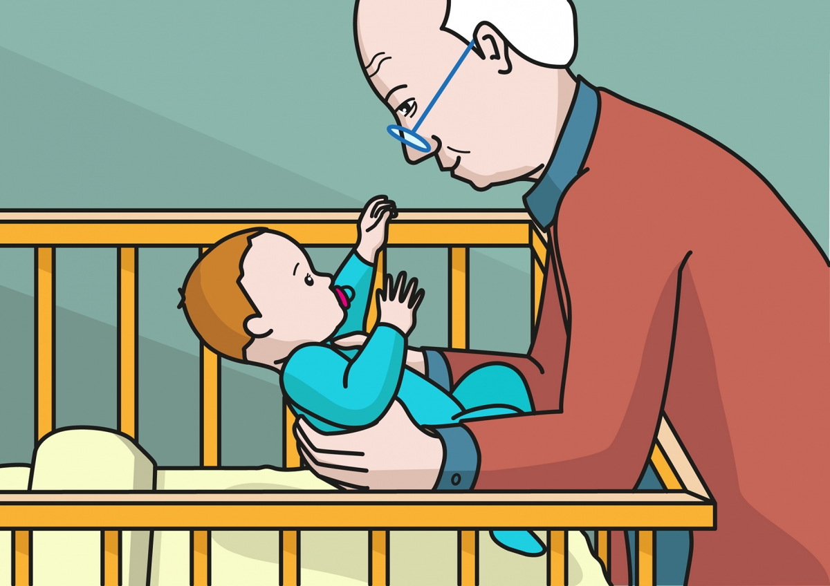 En la escena, se observa al abuelo agachado hacia la cuna y cogiendo al bebé en brazos.