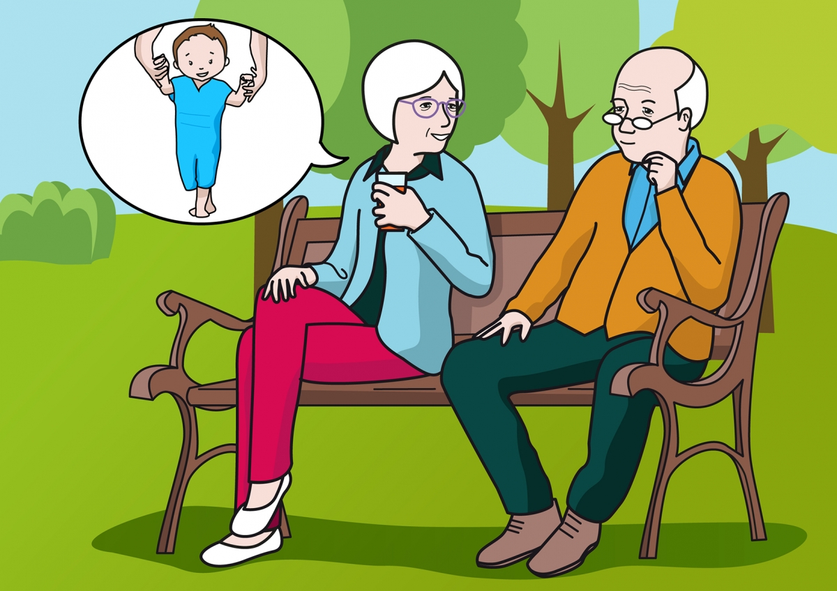 En la escena, se observa a dos personas mayores, un hombre y una mujer, hablando en el parque sobre los primeros pasos de su nieto.