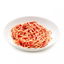 Imagen en la que se ve un plato de espaguetis con tomate frito