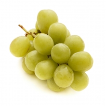 Imagen en la que se ve un racimo de uvas verdes