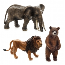 Imagen en la que se ven tres animales: un elefante, un león y un oso