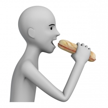 Imagen en la que aparece una persona comiéndose un bocadillo