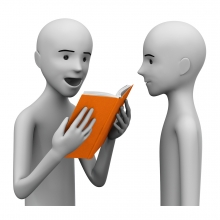 Imagen en la que se ve a una persona leyendo un libro a otra persona