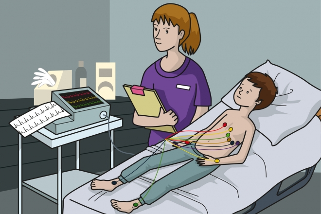 La enfermera le está haciendo un electrocardiograma al niño
